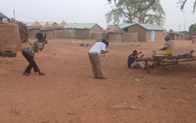 A focused trio of photographers
