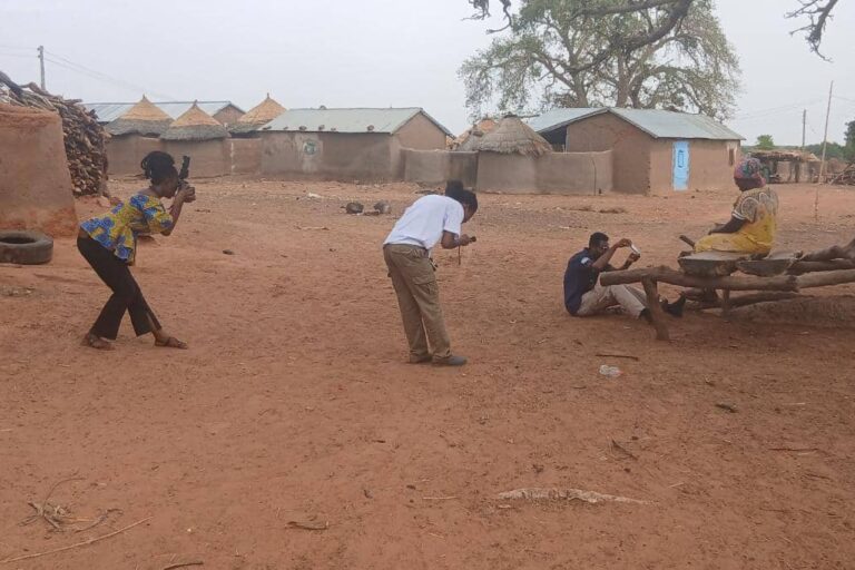 A focused trio of photographers
